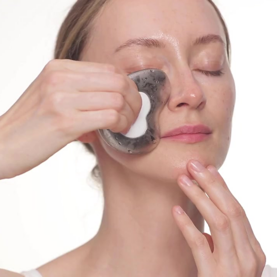 Woman doing facial massage